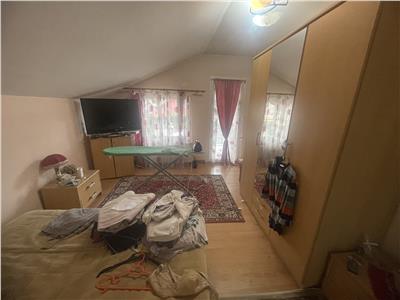 Casa cu 4 camere 2 bai 2 garaje si 500 mp teren in zona Trei Stejari